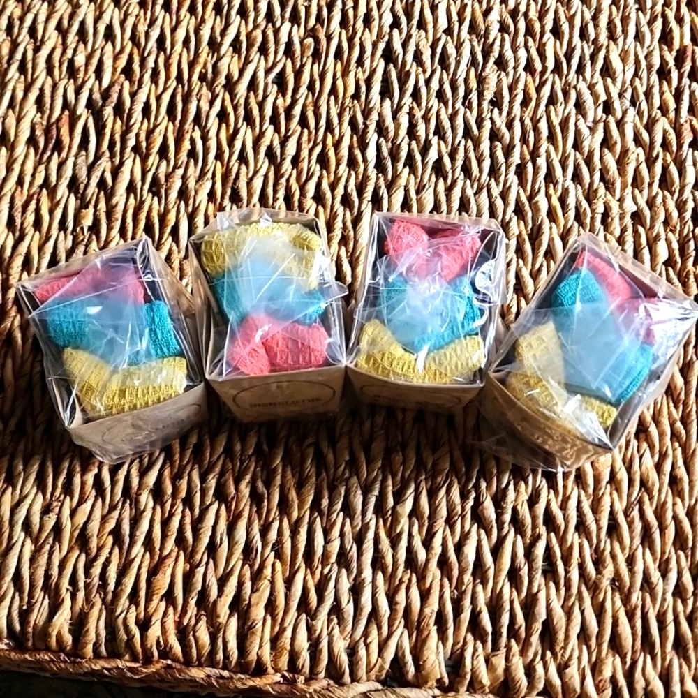 FOUR sets of kitchen dishcloths